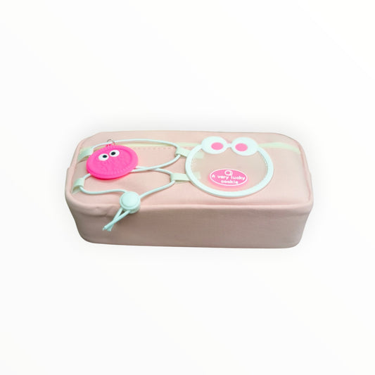 Pink rectangular container with a pink and white toy on a white background
