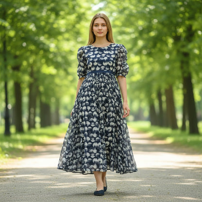 kidshe Anarkali Model 43 kurti in navy blue with white circular patterns, puff sleeves, and a flowing midi silhouette.