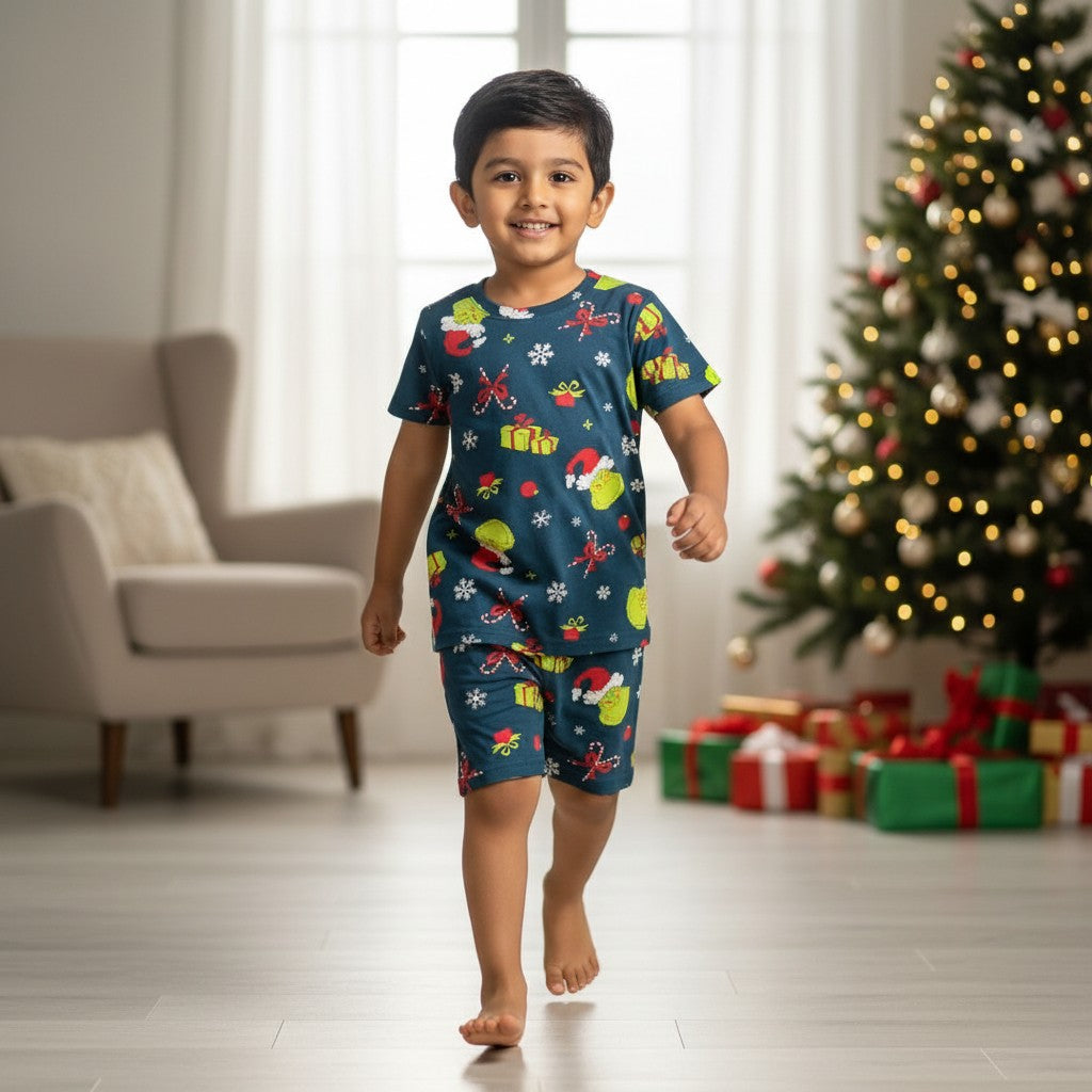 kidshe boy coord set featuring a blue short-sleeve t-shirt and shorts with festive Christmas Grinch print