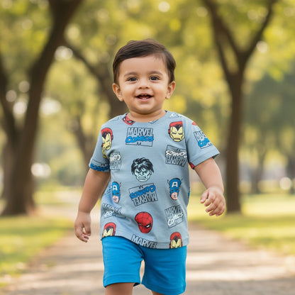 kidshe baby boy set featuring a blue Marvel Comics print t-shirt and matching blue shorts worn by a toddler outdoors