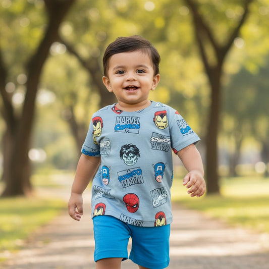 kidshe baby boy set featuring a blue Marvel Comics print t-shirt and matching blue shorts worn by a toddler outdoors
